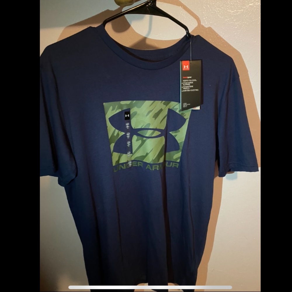 Camo and navy Under Armor tee.